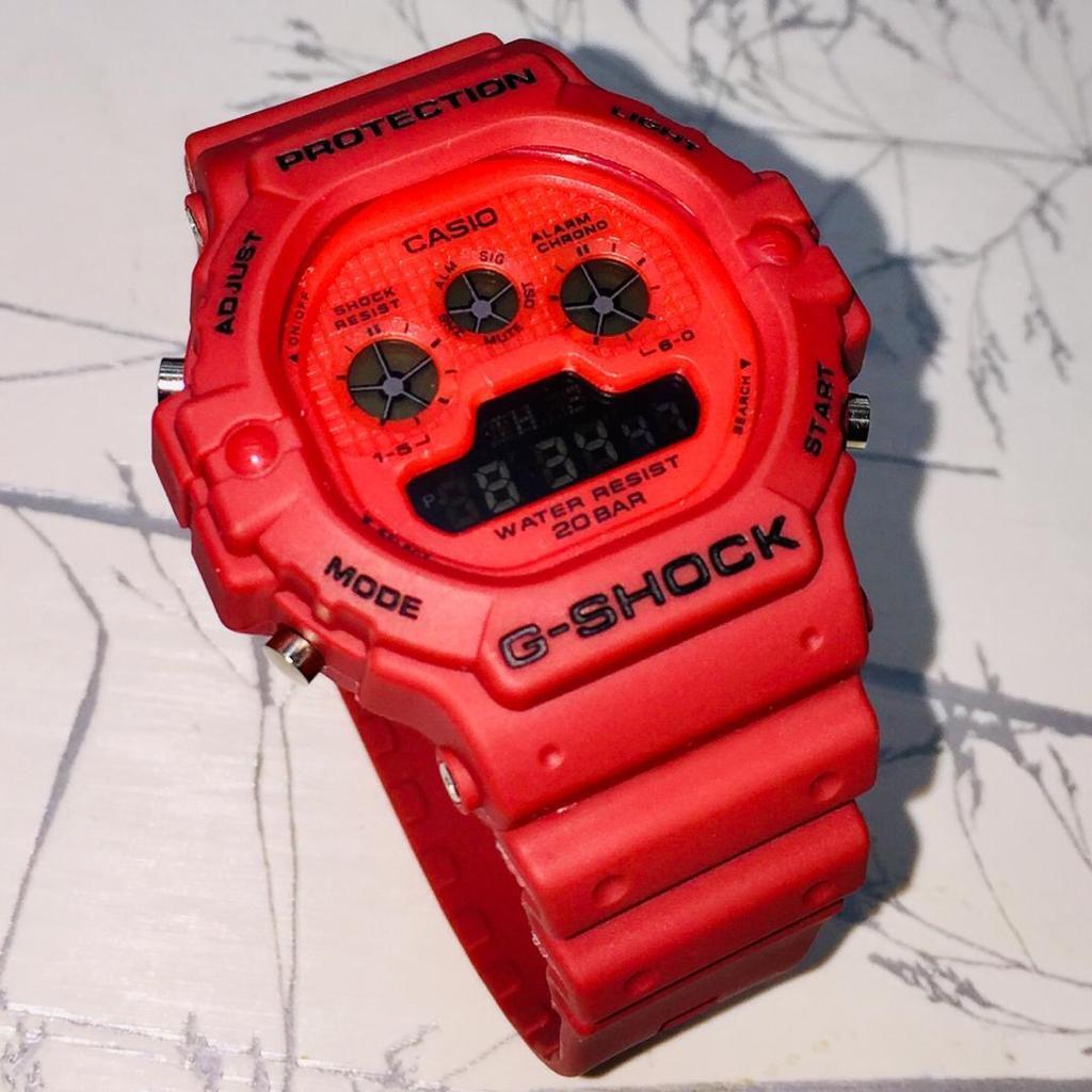 G shock merah sale